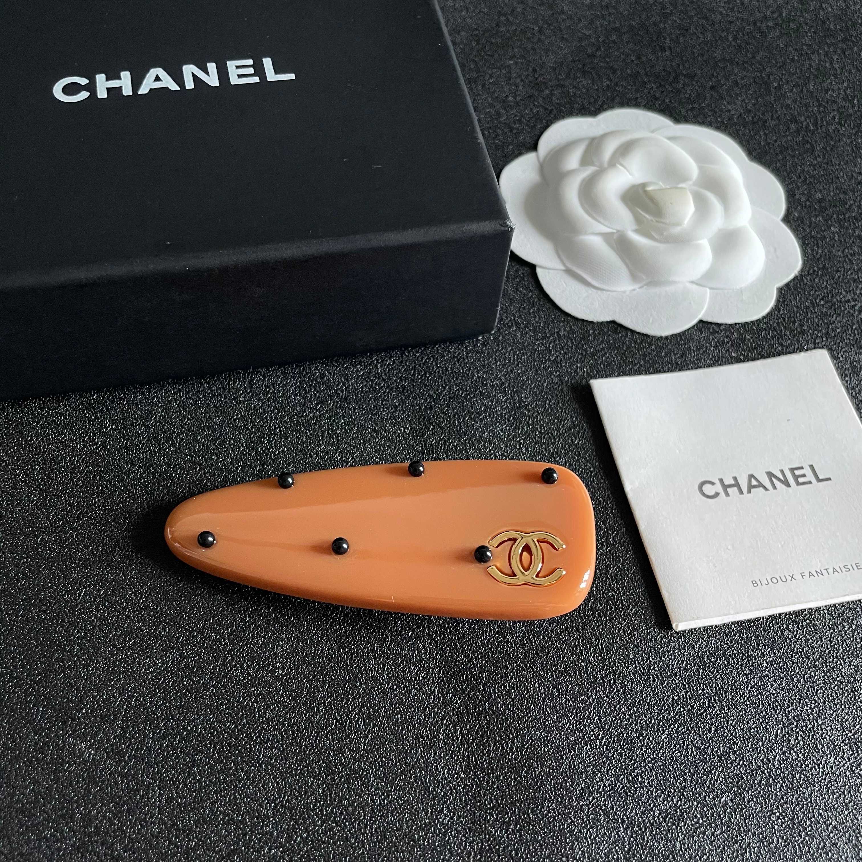 Chanel Orange Hair Clip with Black Dots